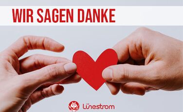 Zwei Hände, die sich ein rotes Herz reichen, Schriftzug "Wir sagen Danke"